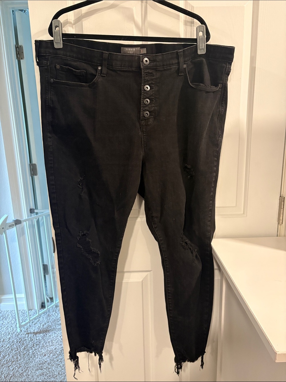 torrid Black Skinny Jeans with Distressed Hem